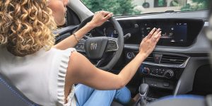 A lady sitting in a brand new 2025 Buick Encore GX. 