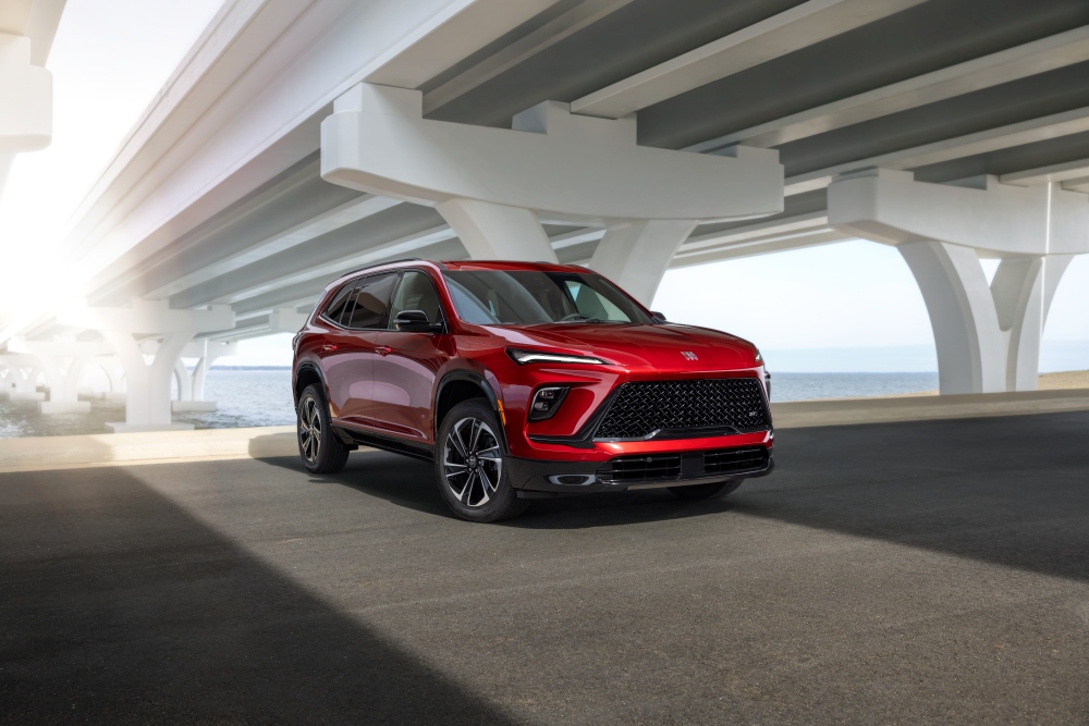 Red 2026 Buick Enclave parked under an overpass 